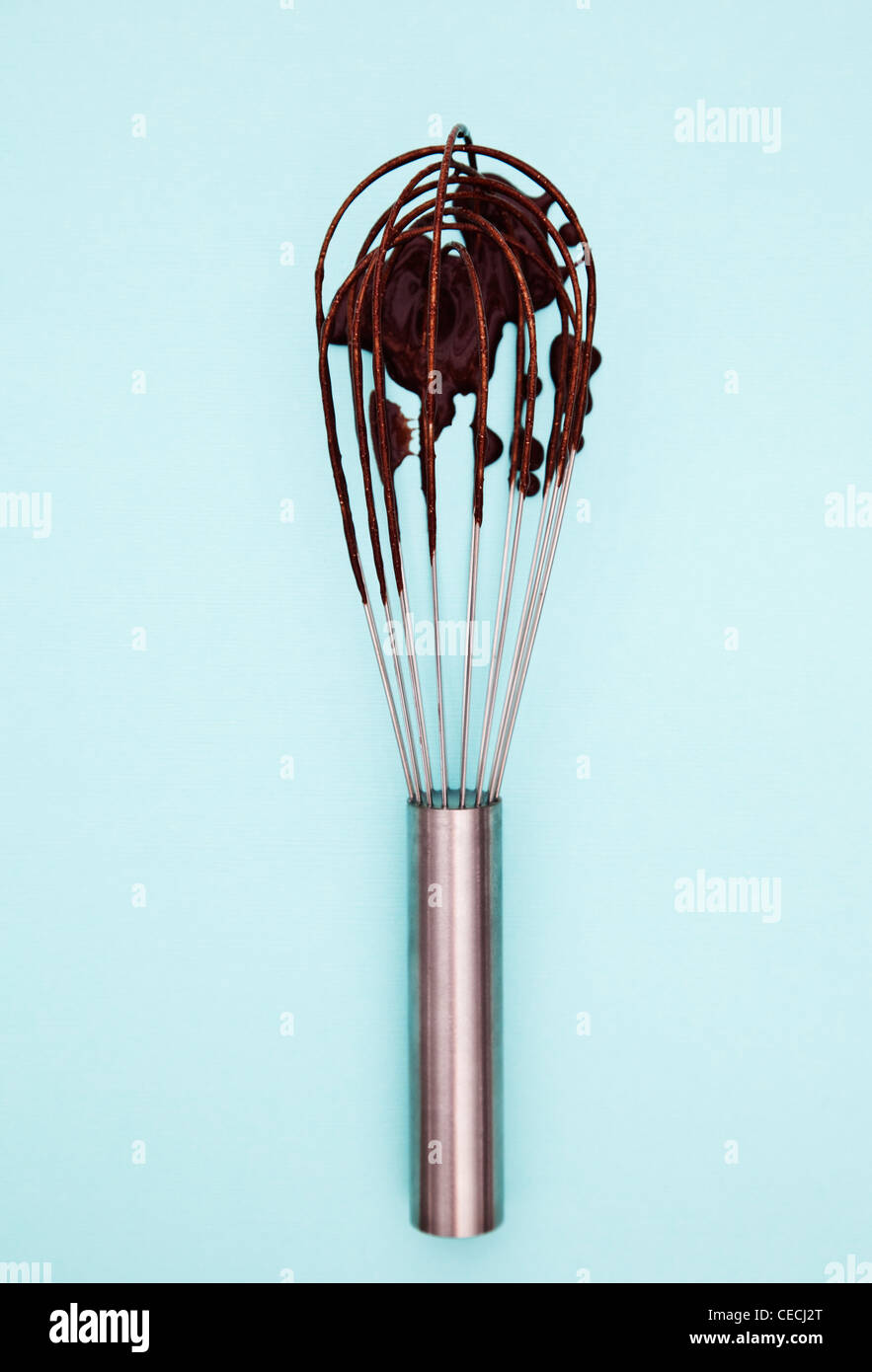 Wire whisk with batter Stock Photo