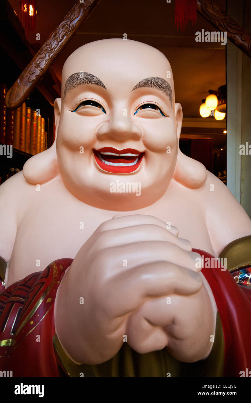 Laughing buddha hi-res stock photography and images - Alamy