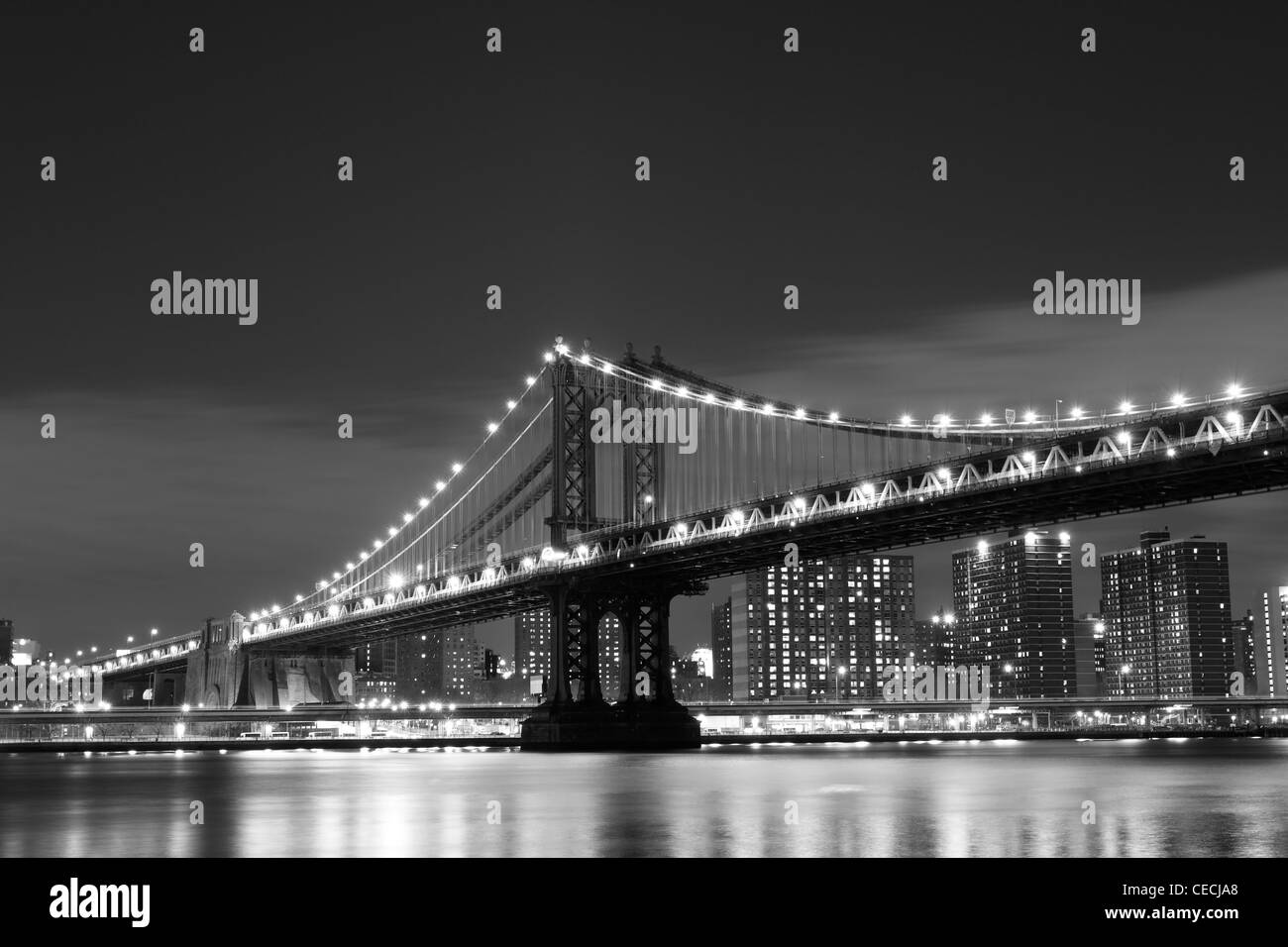 Manhattan Skyline and Manhattan Bridge At Night, New York City Stock ...