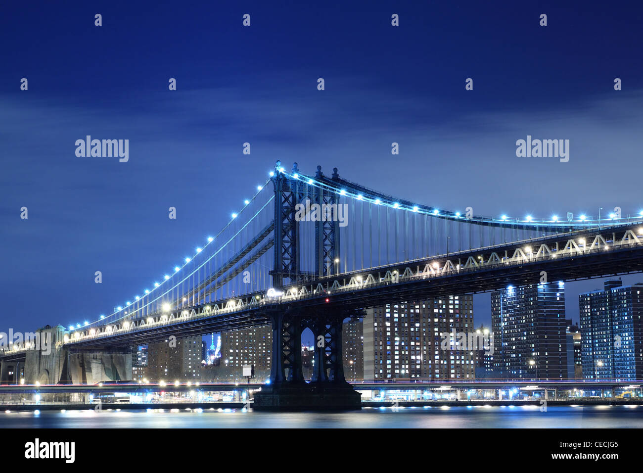 Manhattan Skyline and Manhattan Bridge At Night, New York City Stock ...