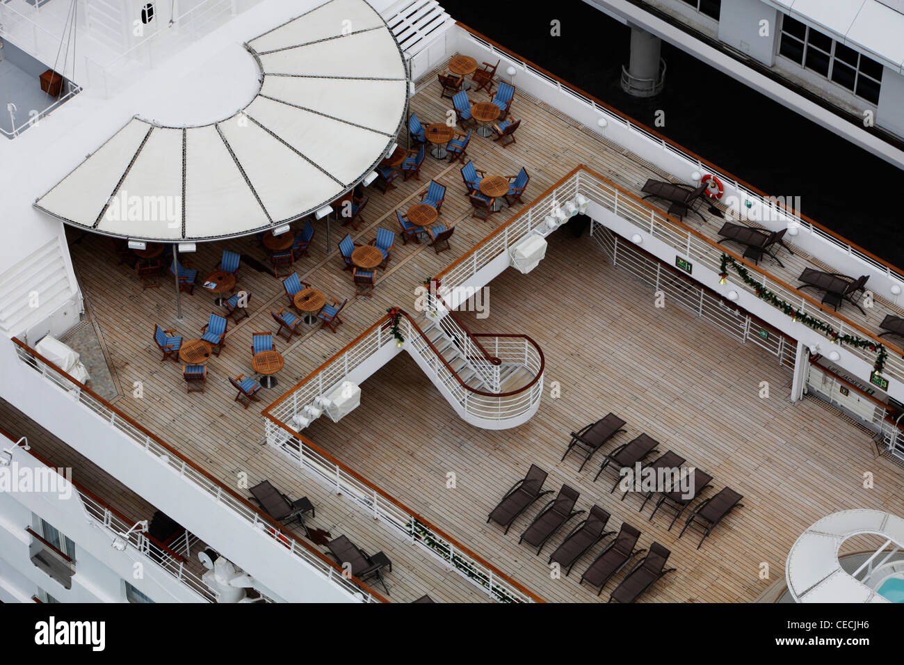 Arial view of a yacht with deck chairs Stock Photo