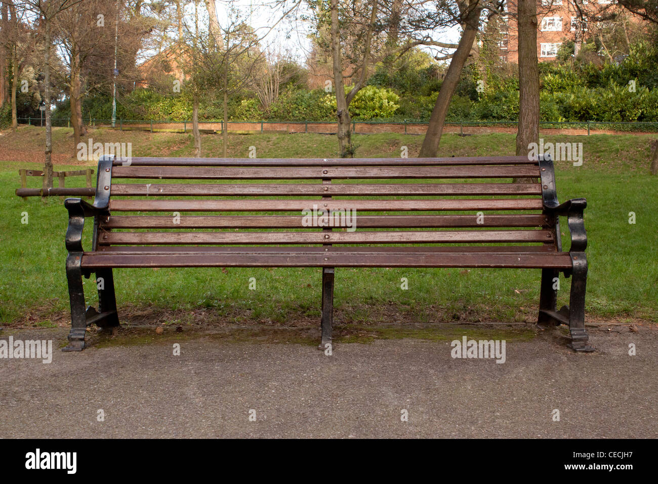 Empty park bench Stock Photo
