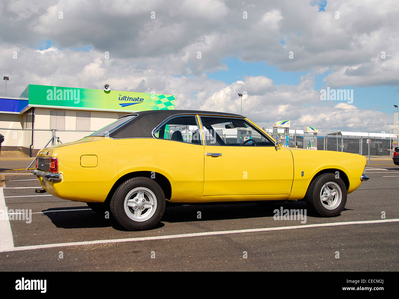 Bright Yellow Ford Cortina Mk3 2000cc GT, Parked in the paddock at Silverstone Stock Photo