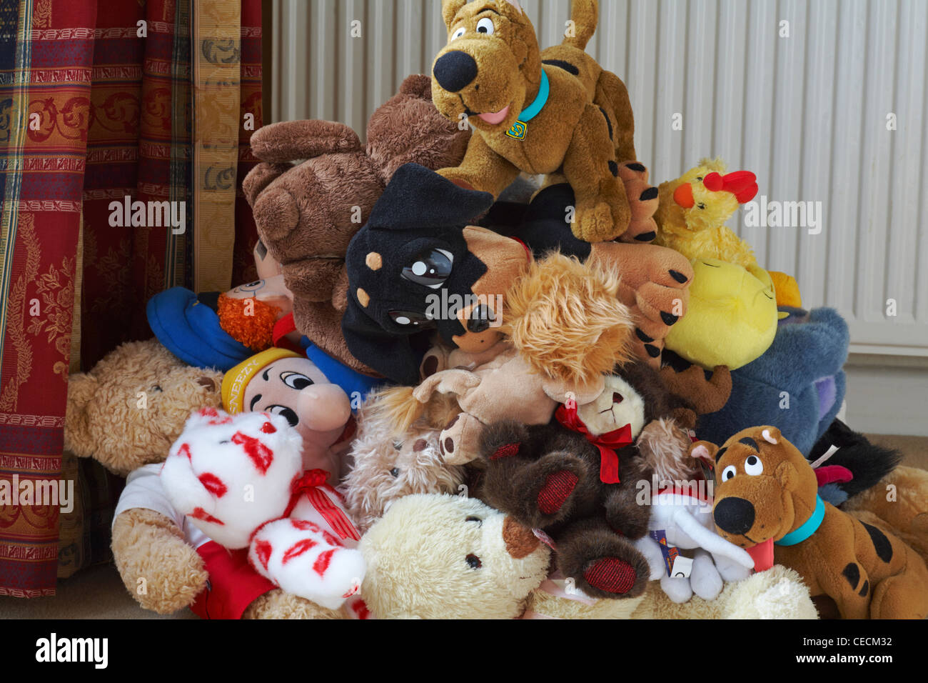 Pile of soft cuddly toys ready to declutter and take to charity shop Stock Photo