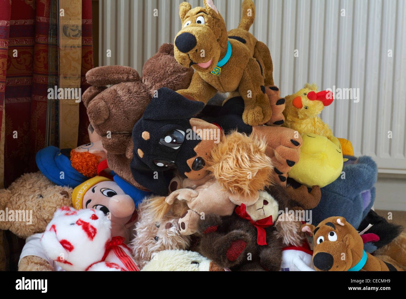 Pile of soft cuddly toys ready to declutter and take to charity shop Stock Photo