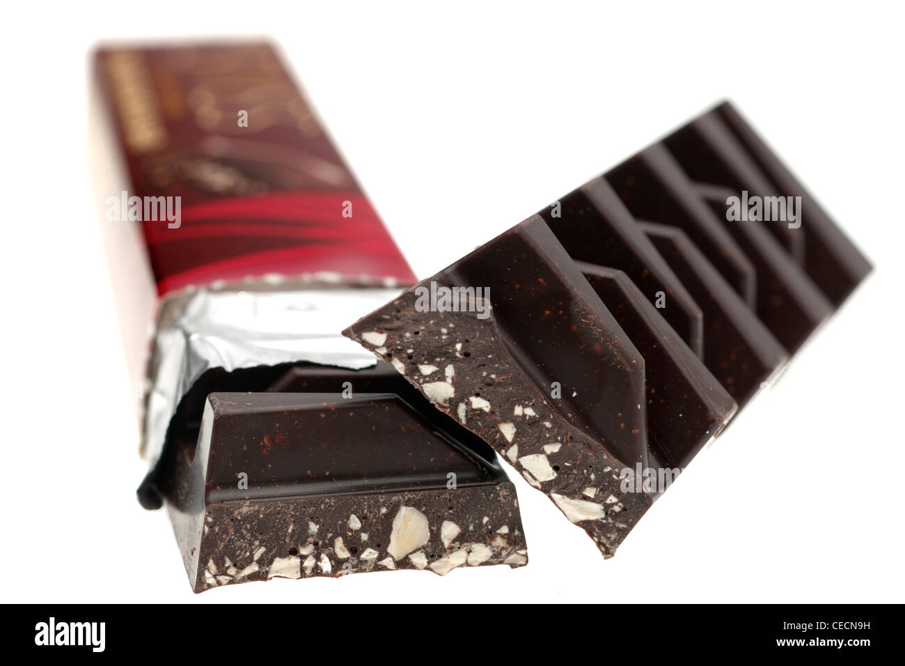Chunky dark chocolate with almond nougat pieces Stock Photo Alamy
