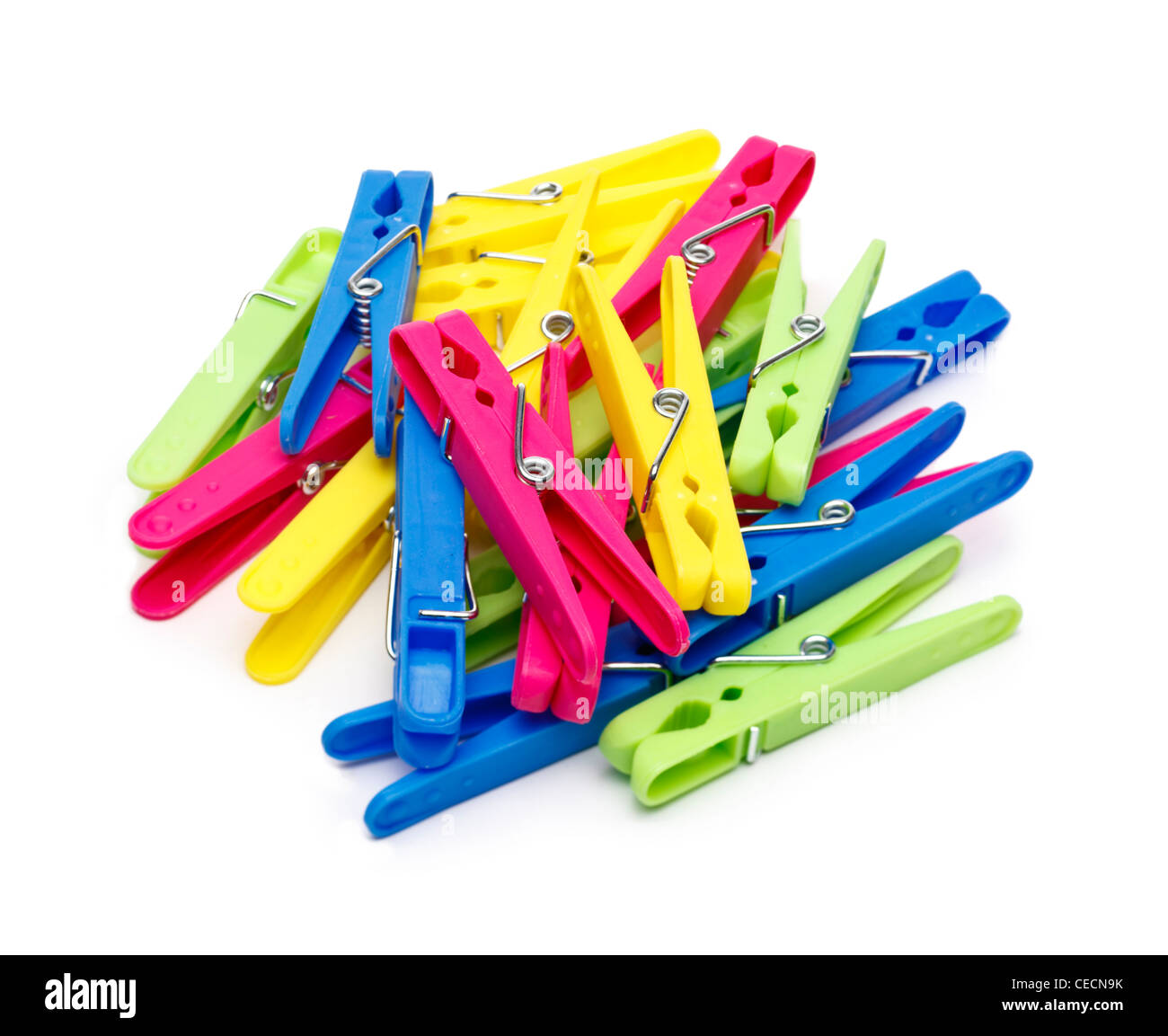 Pile of clothes pegs on white background Stock Photo