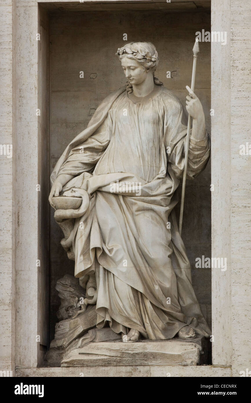 A Statue of a lady holding a stave outside St. Peter's Basilica Basilica di San Pietro Vatican city Rome Stock Photo