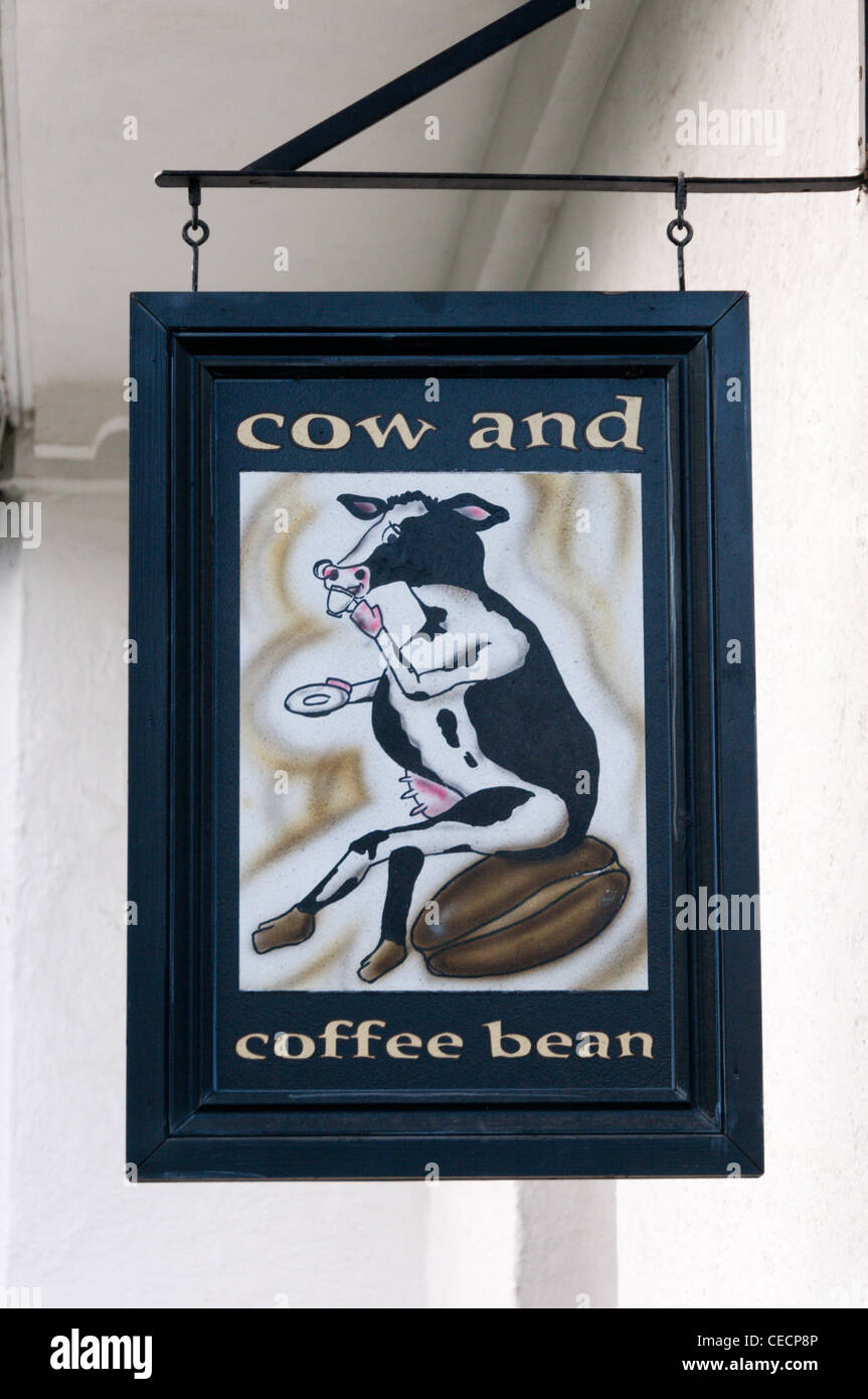 The sign of the Cow and Coffee Bean cafe just inside the main gates to Greenwich Park. Stock Photo