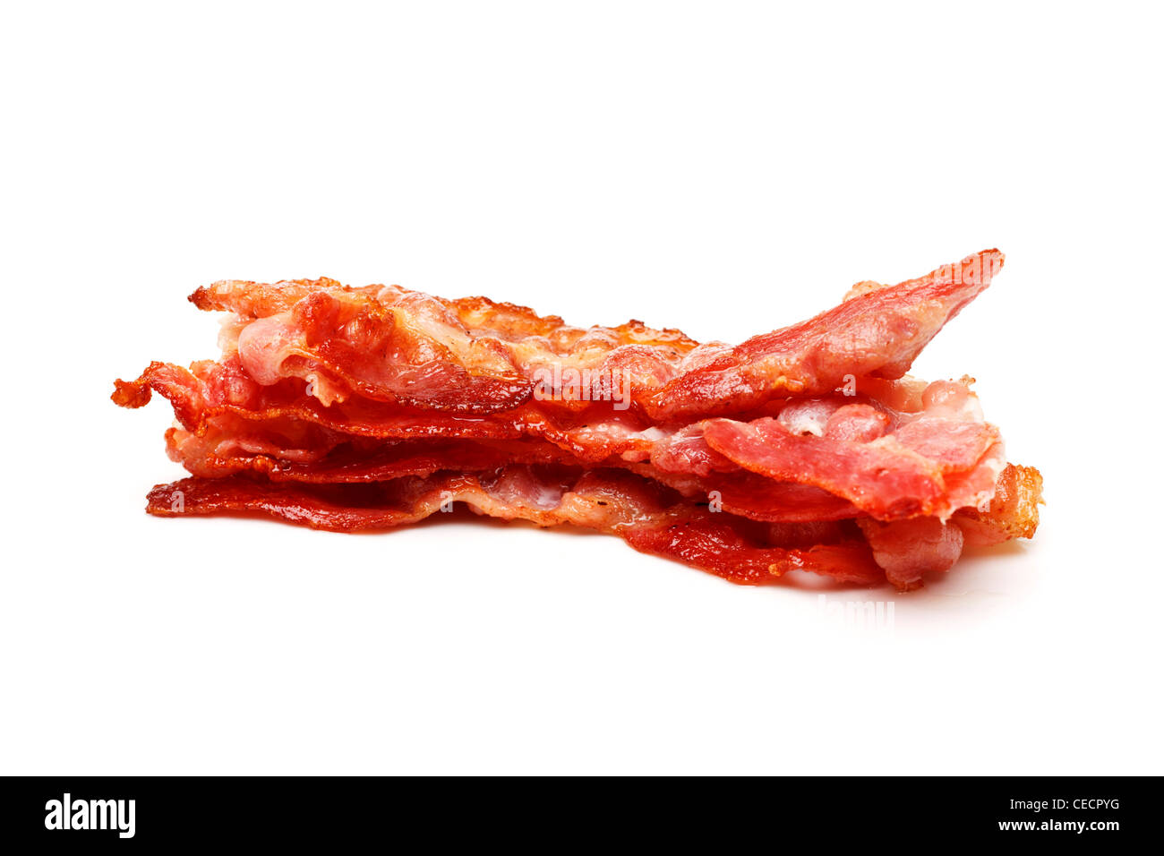 Bacon pile of rashers on white background Stock Photo