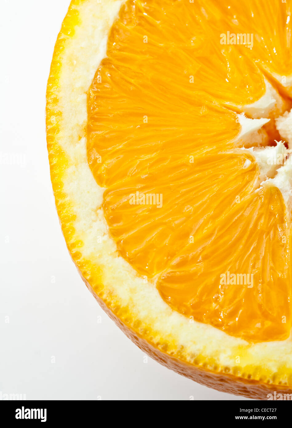 Close-up of half an orange on a plate Stock Photo