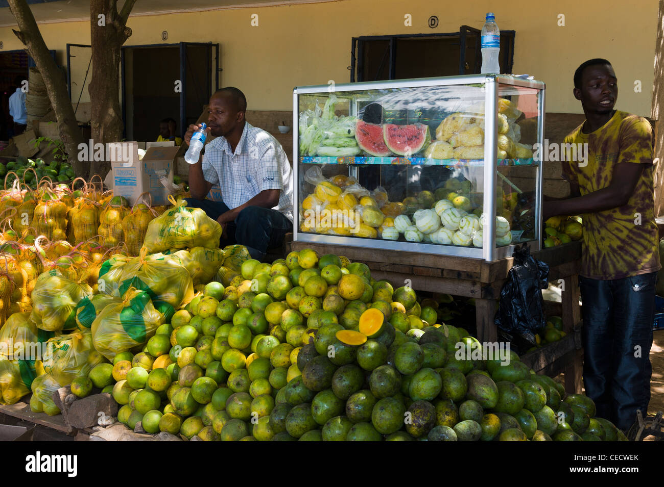 Men selling fresh fruits at a bus stand in Korogwe Tanga Region Tanzania Stock Photo