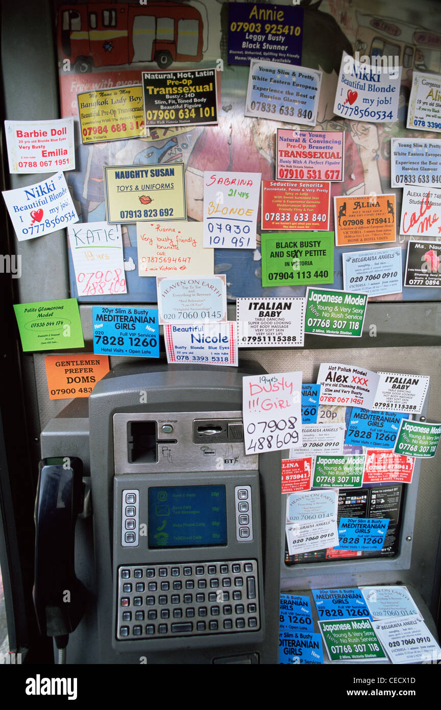 England, London, Call Girl Calling Cards in Telephone Box Stock Photo -  Alamy