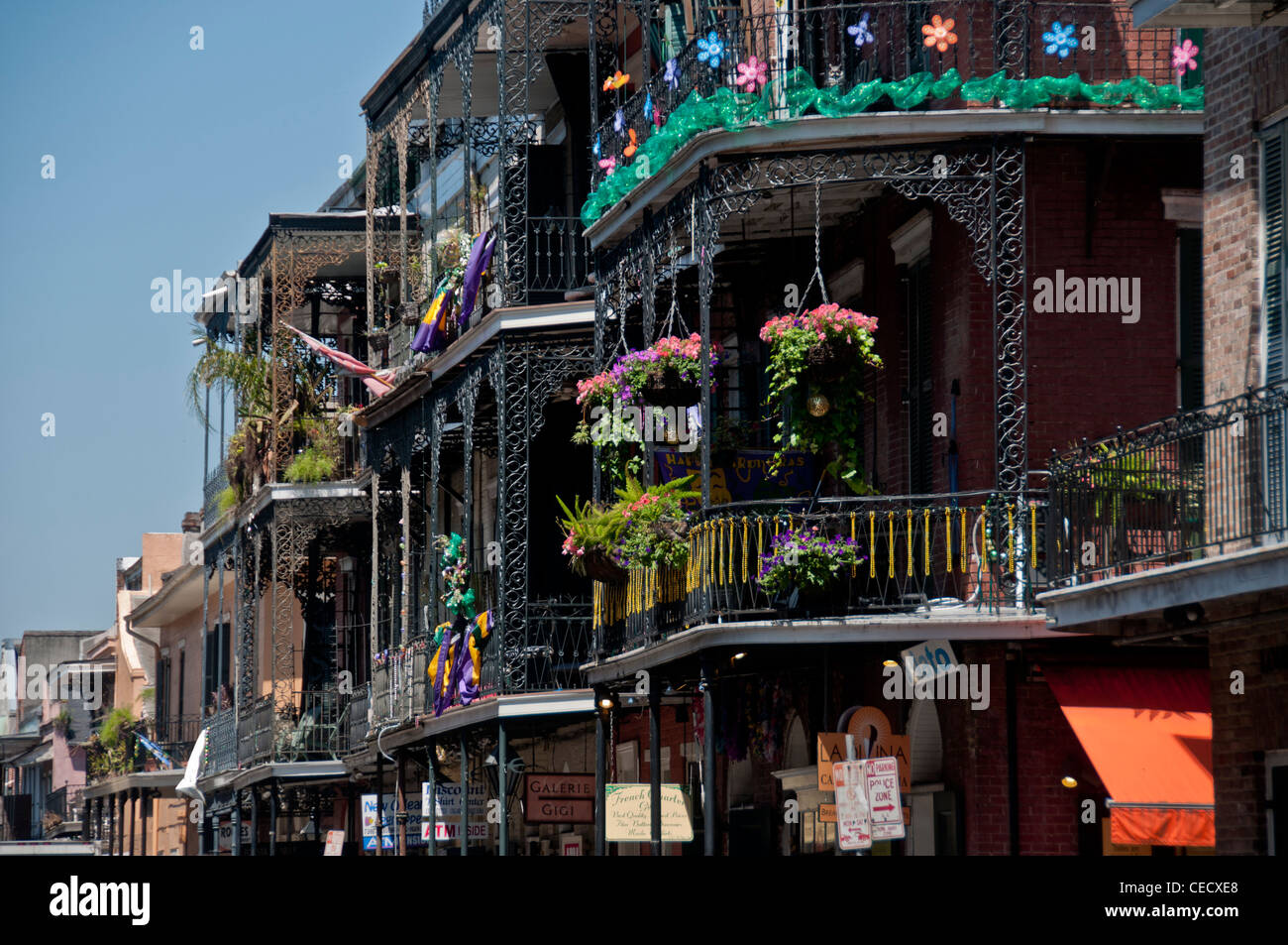 Wrought iron balconies lining the narrow streets of New Orleans Stock