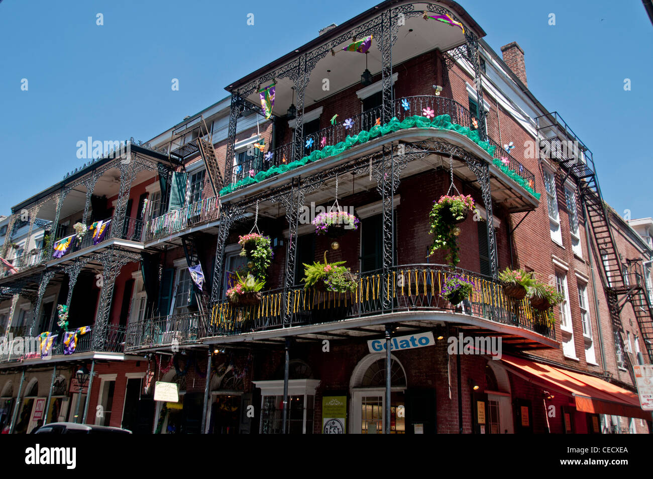 Wrought iron balconies lining the narrow streets of New Orleans Stock