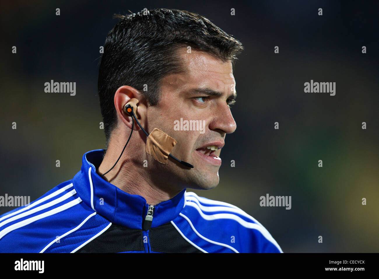 Referee Viktor Kassai (Hungary) talks into his headset during warmups  before a FIFA World Cup match between Ghana and the USA Stock Photo - Alamy