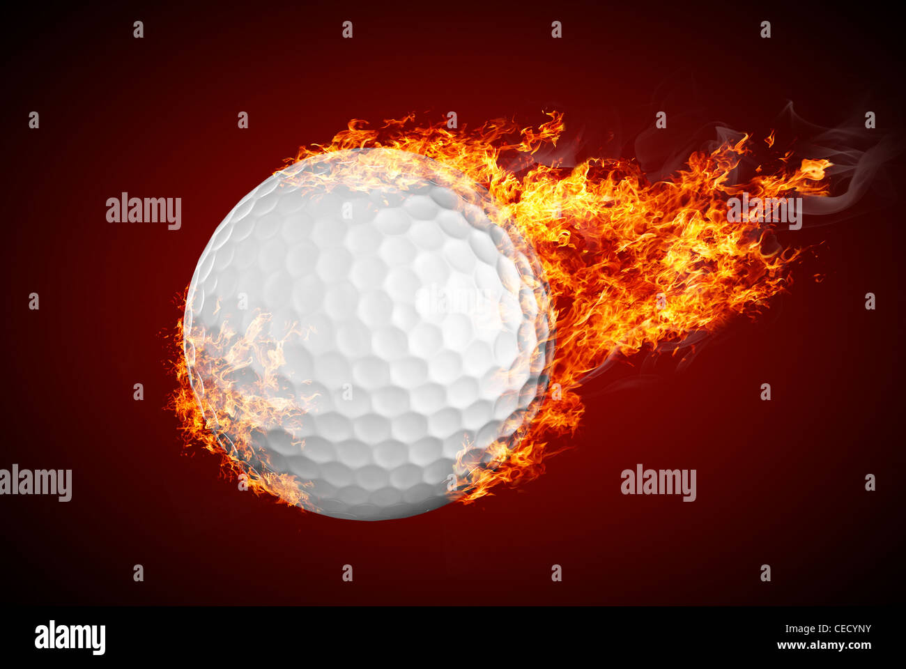 Flying golf ball on fire Stock Photo - Alamy