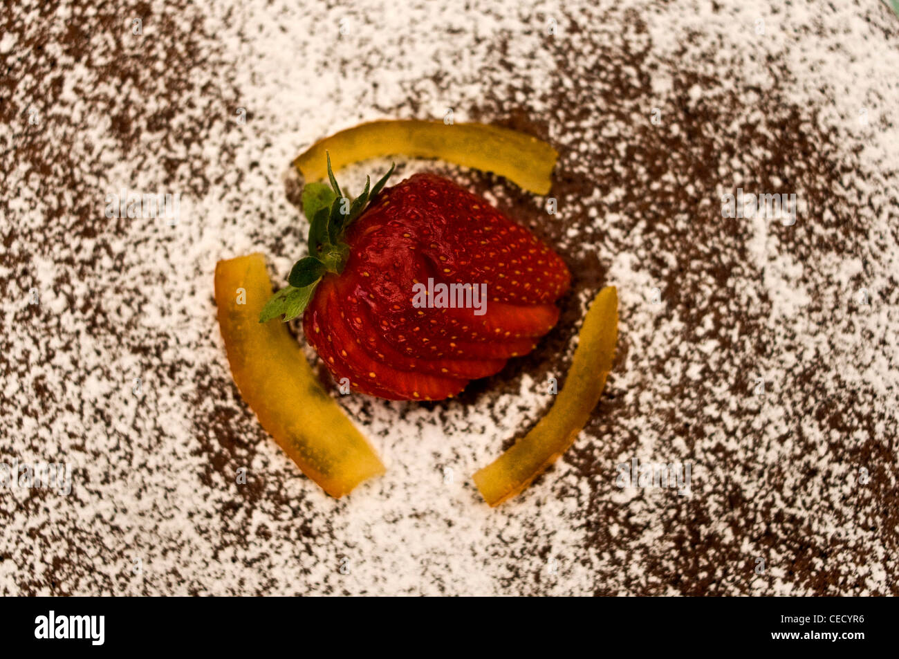 Diplomat cake or Charlotte Cake with strwaberries and lady fingers in baking  pan on a wooden table with pink background Stock Photo - Alamy