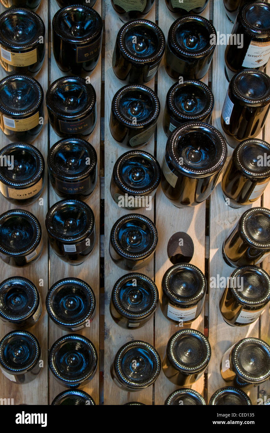 Sparkling Wine and Champagne Bottles Stored in Riddling Rack at Italian Enoteca Stock Photo Alamy