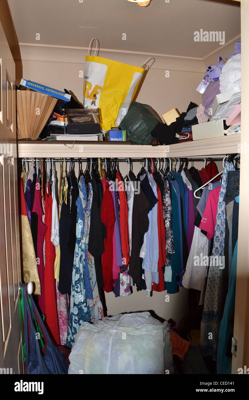 Walk In Wardrobe Full Of Clothes And Other Things Stock Photo