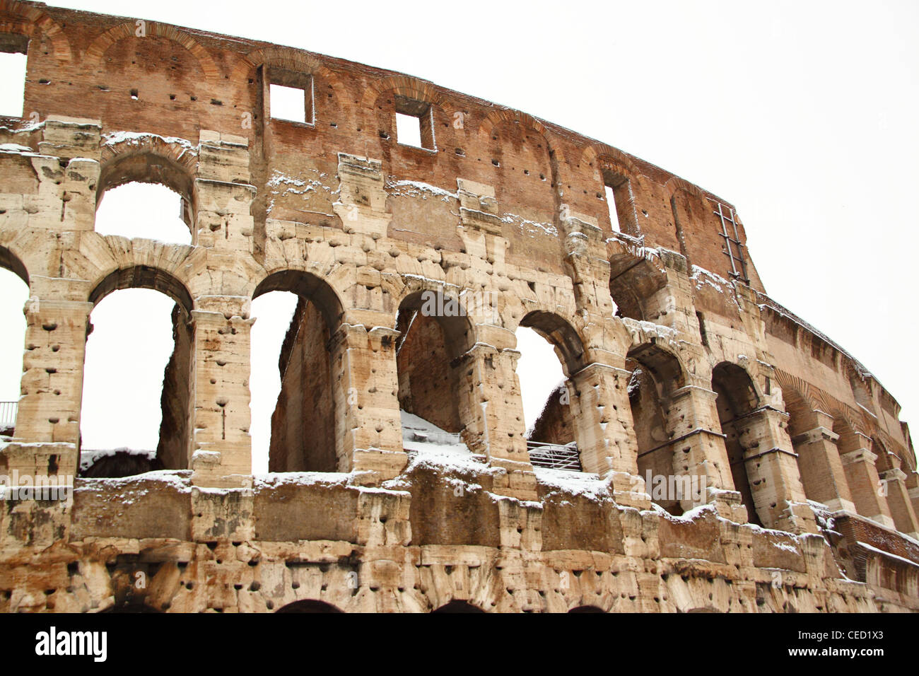 The Coliseum covered by snow, a really rare event in Rome Stock Photo ...