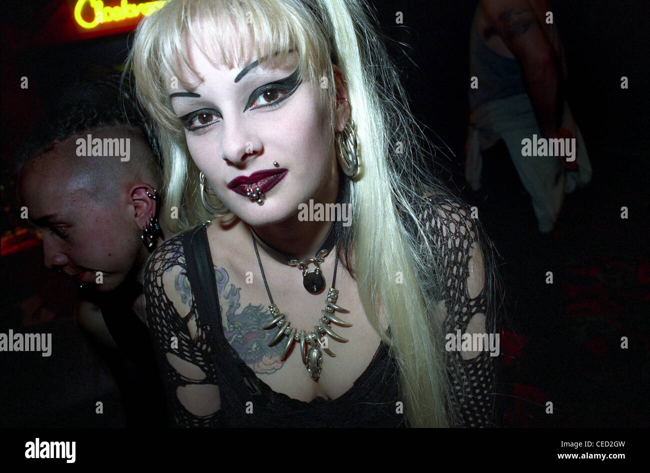 A beautiful goth girl at a tattooing festival Stock Photo - Alamy