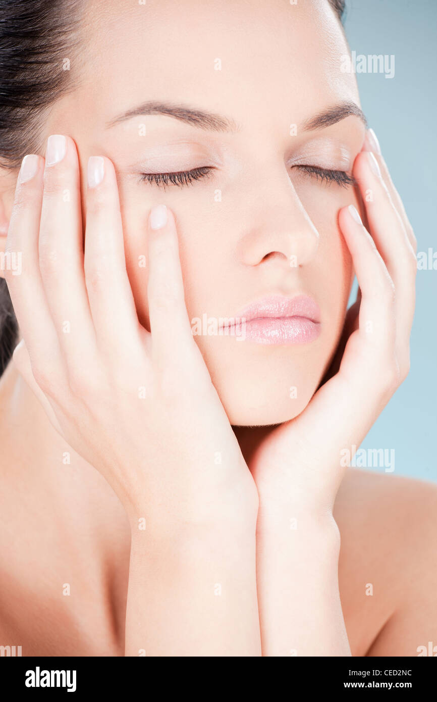 pretty young woman with closed eyes Stock Photo