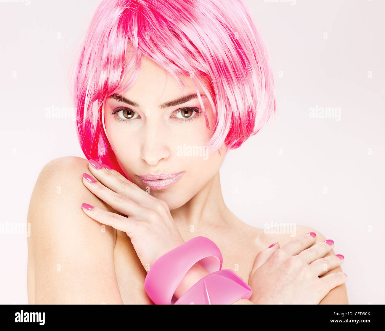 Portrait of a pretty young pink hair woman Stock Photo