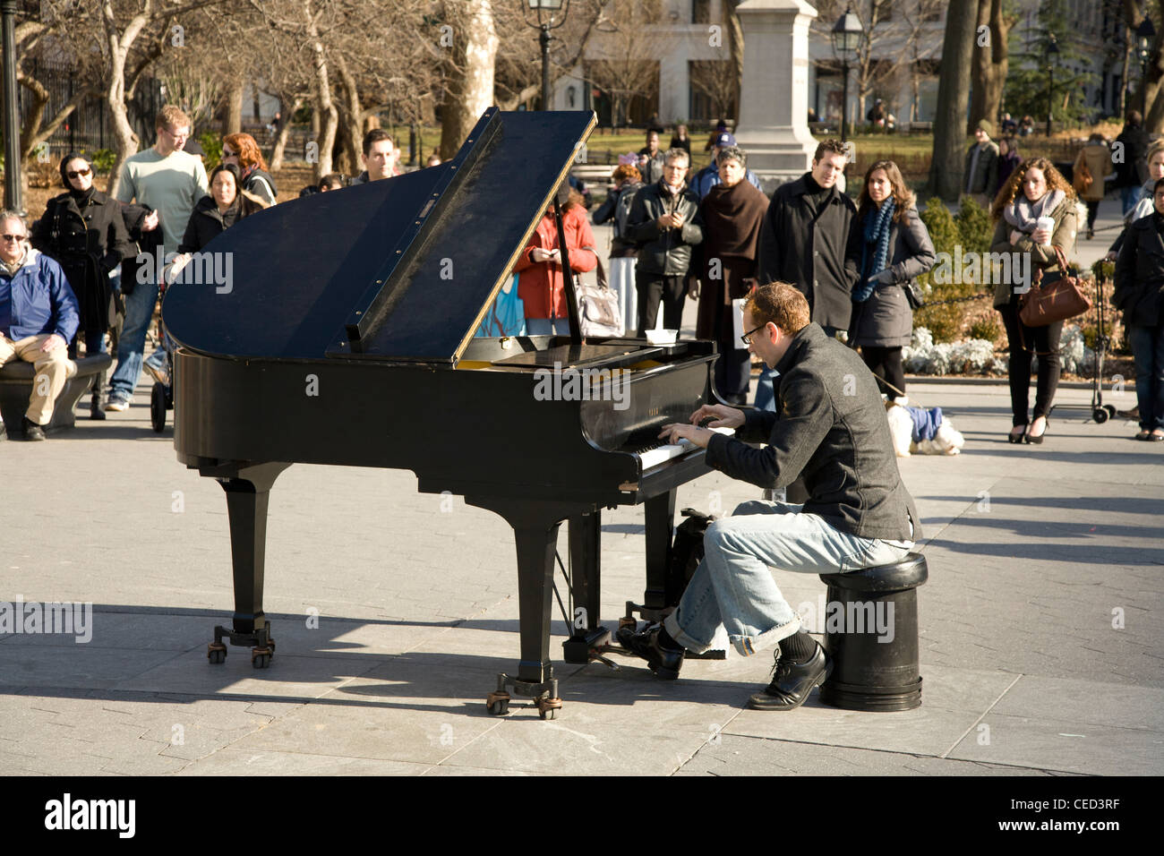 Classical pianist performs for passersby in Washington Square, Manhattan, NYC. Stock Photo