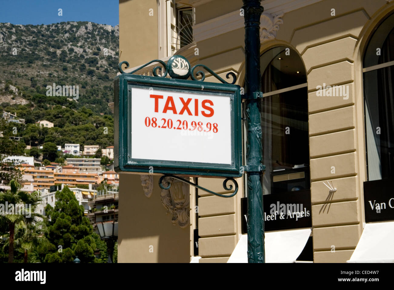 A taxi sign outside an expensive jewellery shop in Monte Carlo Monaco Stock Photo