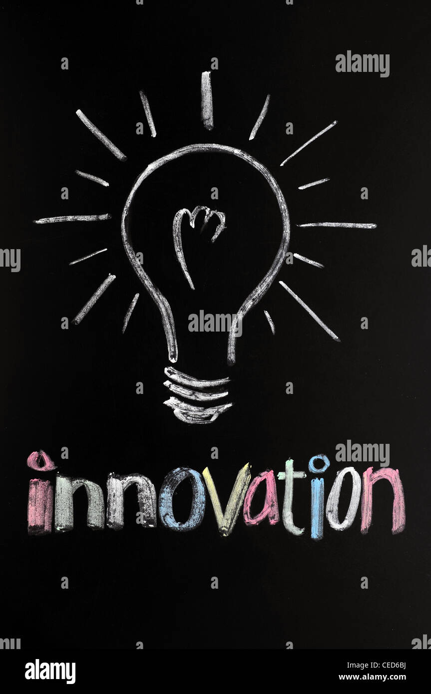 innovation with a bulb drawn in chalk on a blackboard Stock Photo