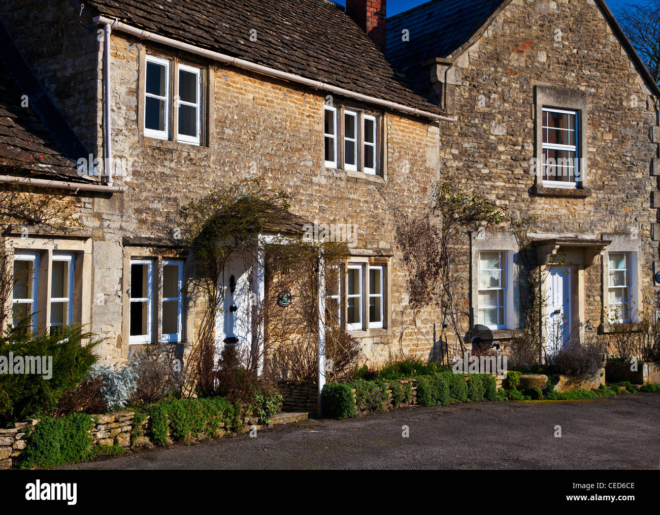 Typical traditional Cotswold stone cottages in the English village of ...