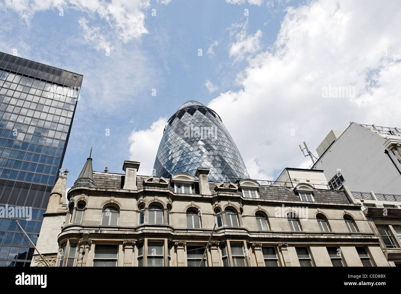 Mixed architecture twilight modern and classical architecture swiss re tower the gherkin tower london