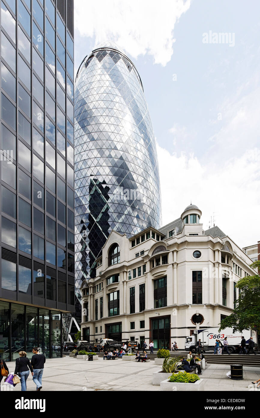 Mixed architecture twilight modern and classical architecture swiss re tower the gherkin tower london