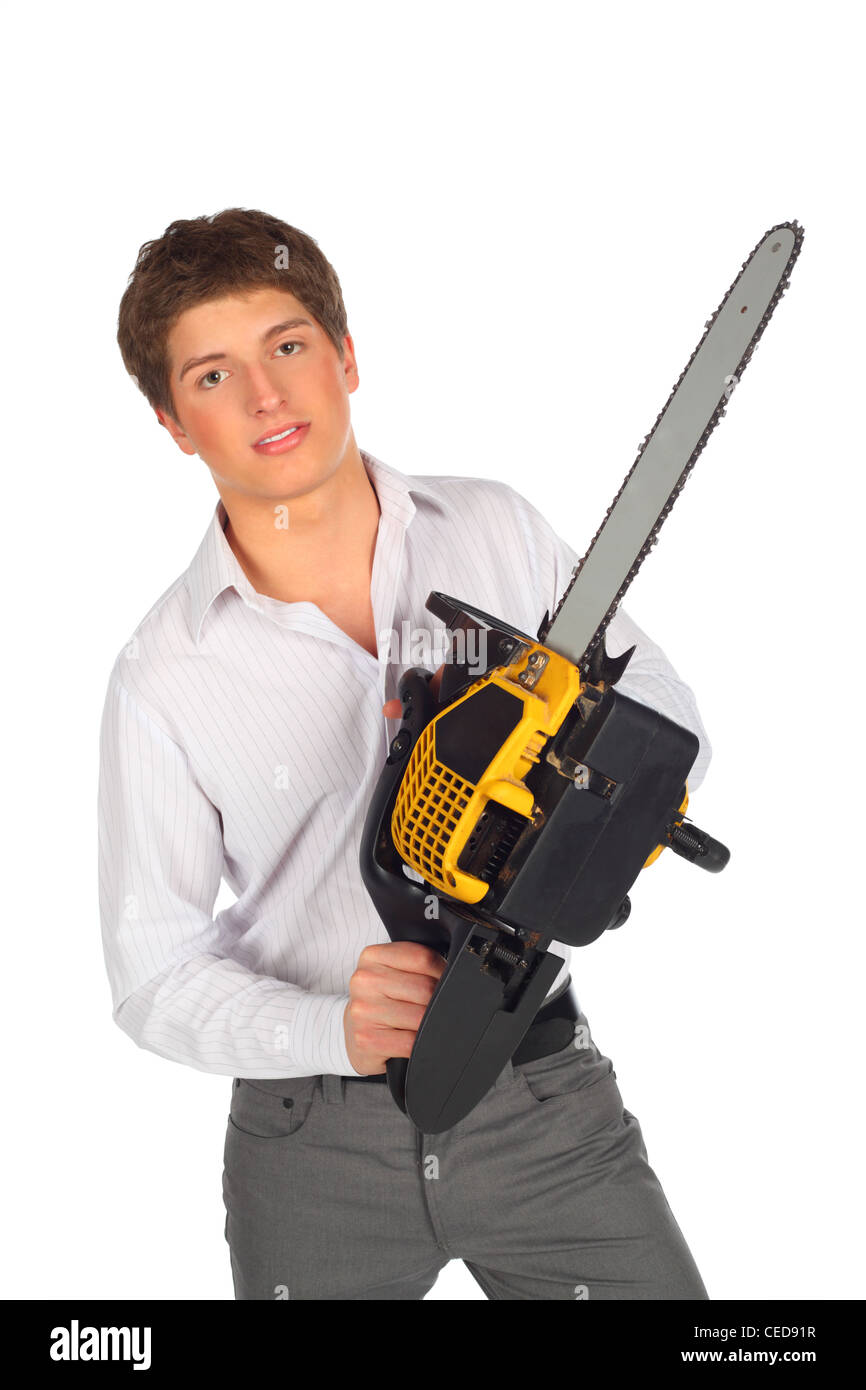 Young man with chainsaw Stock Photo
