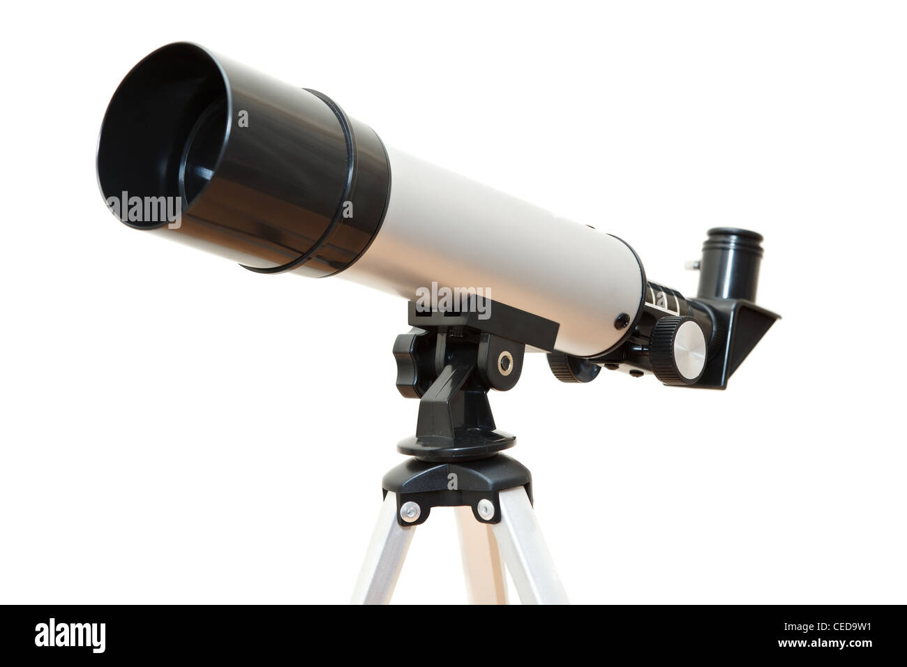 Telescope device isolated on white background. Focus on foreground Stock Photo