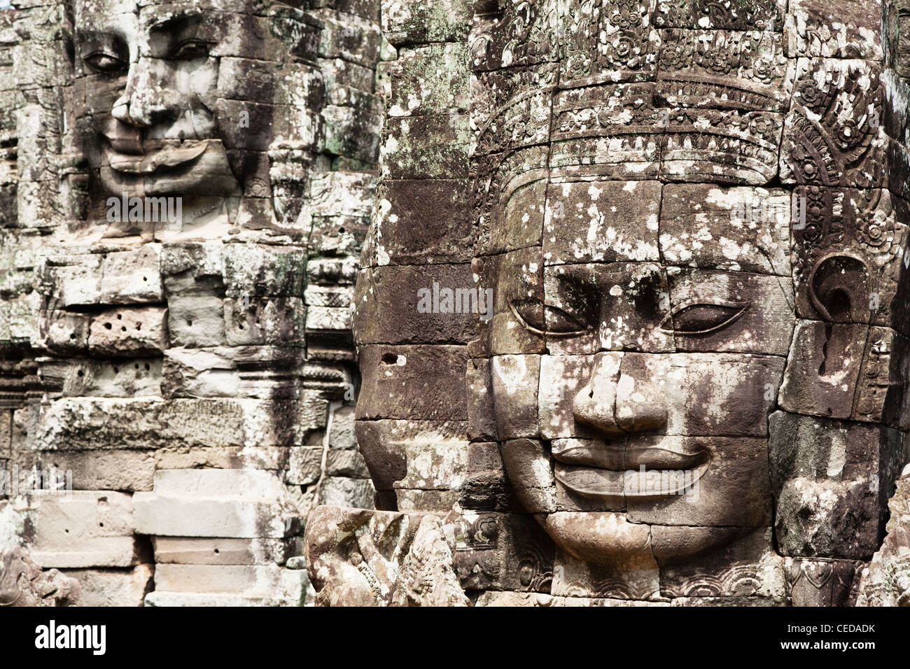 Stone faces in Avalokiteshvara, Bayon Temple Stock Photo