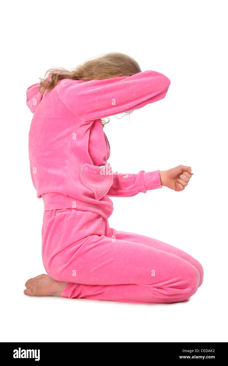 Girl in pink sport clothes represents  letter E Stock Photo