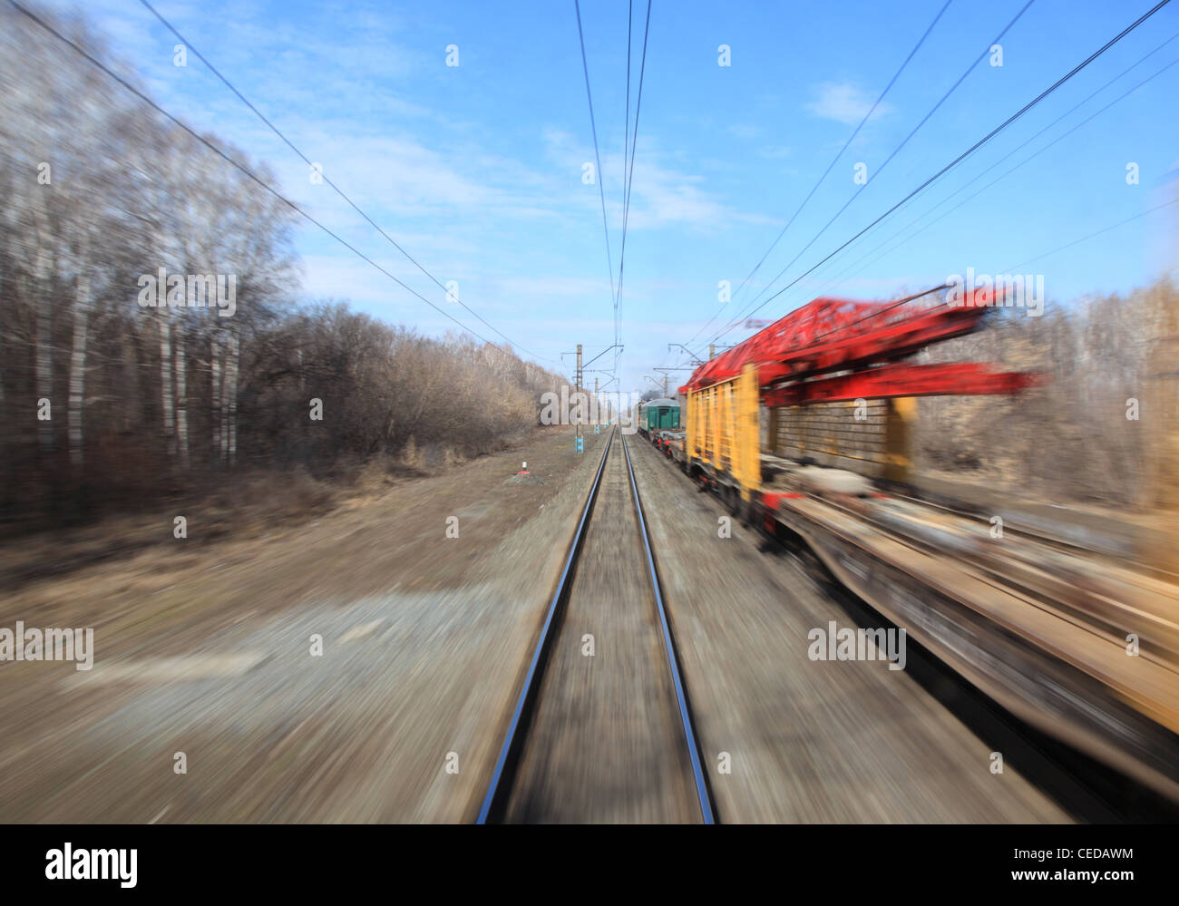 View on railway from moving train, motion blur Stock Photo