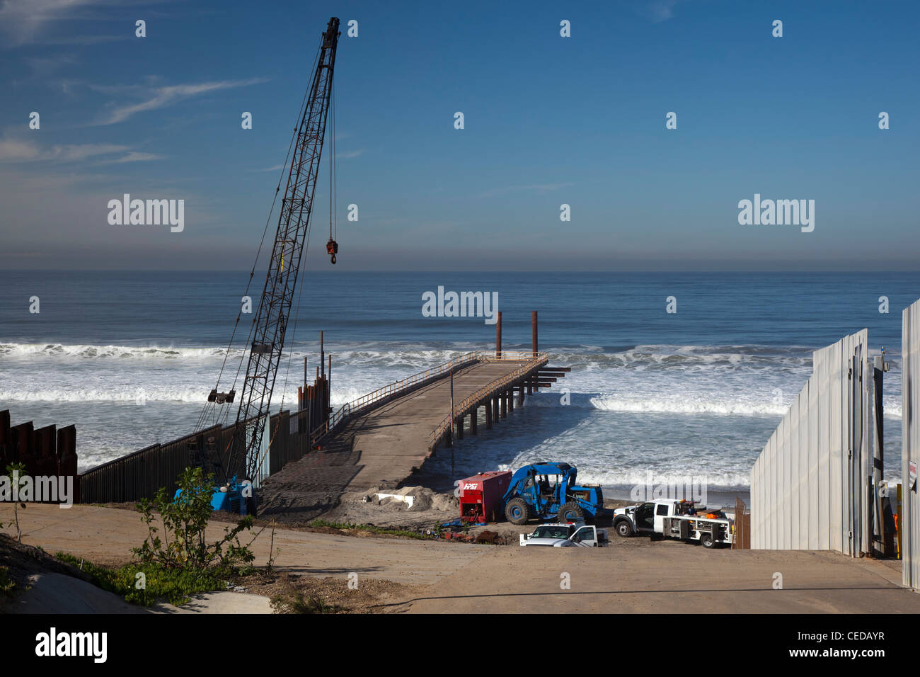 U.S.-Mexico Border Fence Construction Project at Pacific Ocean Stock Photo