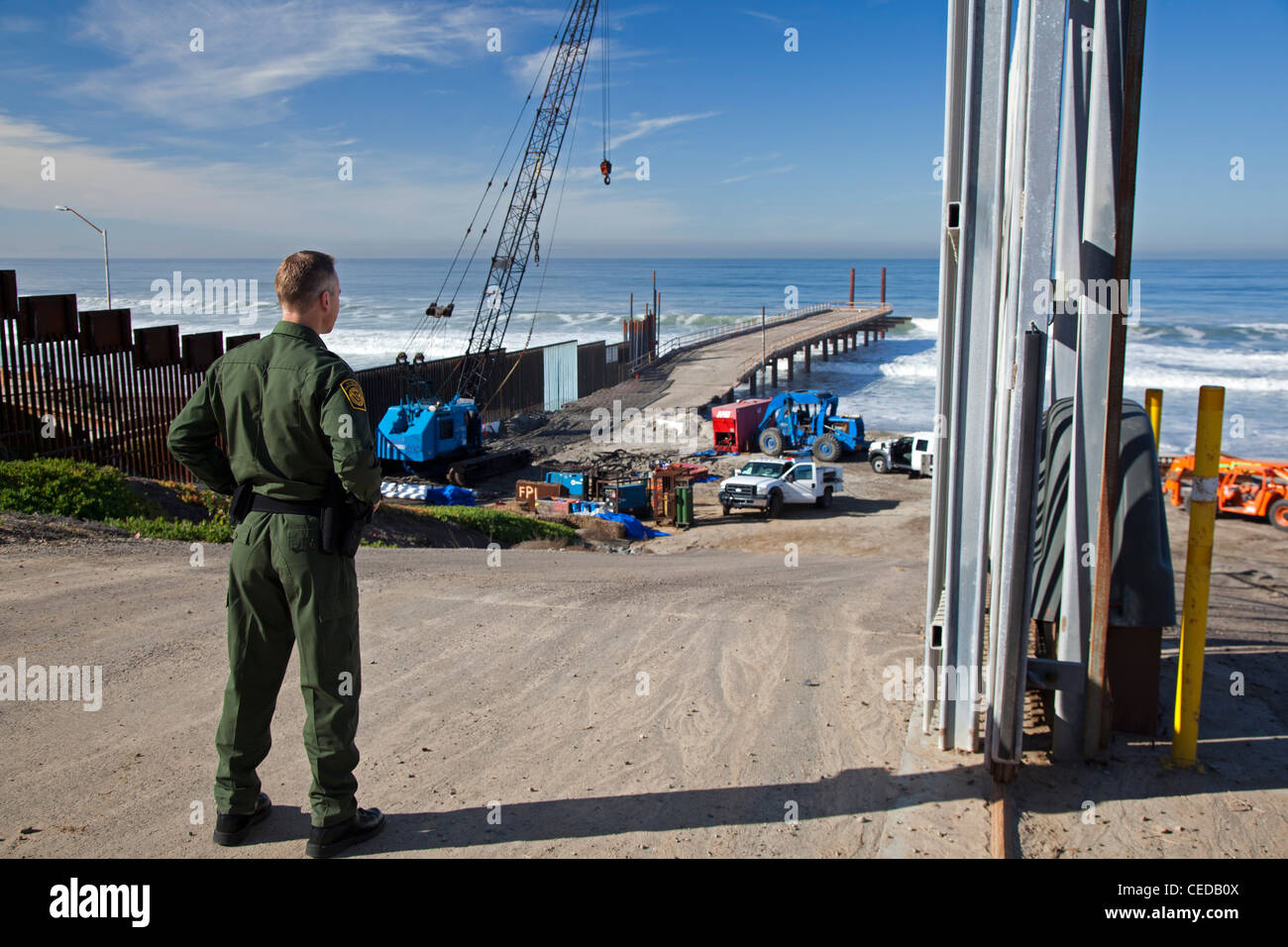 U.S.-Mexico Border Fence Construction Project at Pacific Ocean Stock Photo