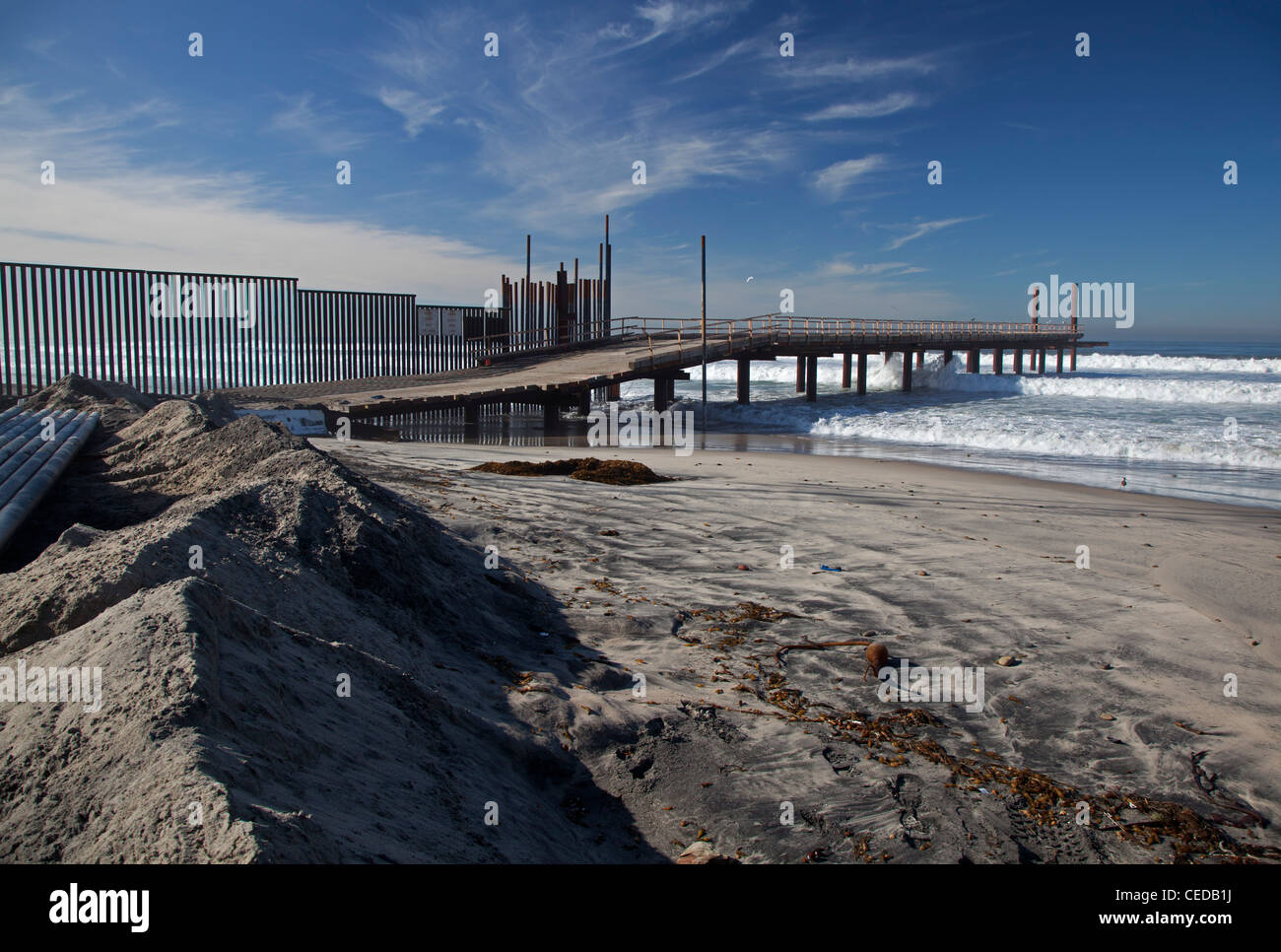 U.S.-Mexico Border Fence Construction Project at Pacific Ocean Stock Photo