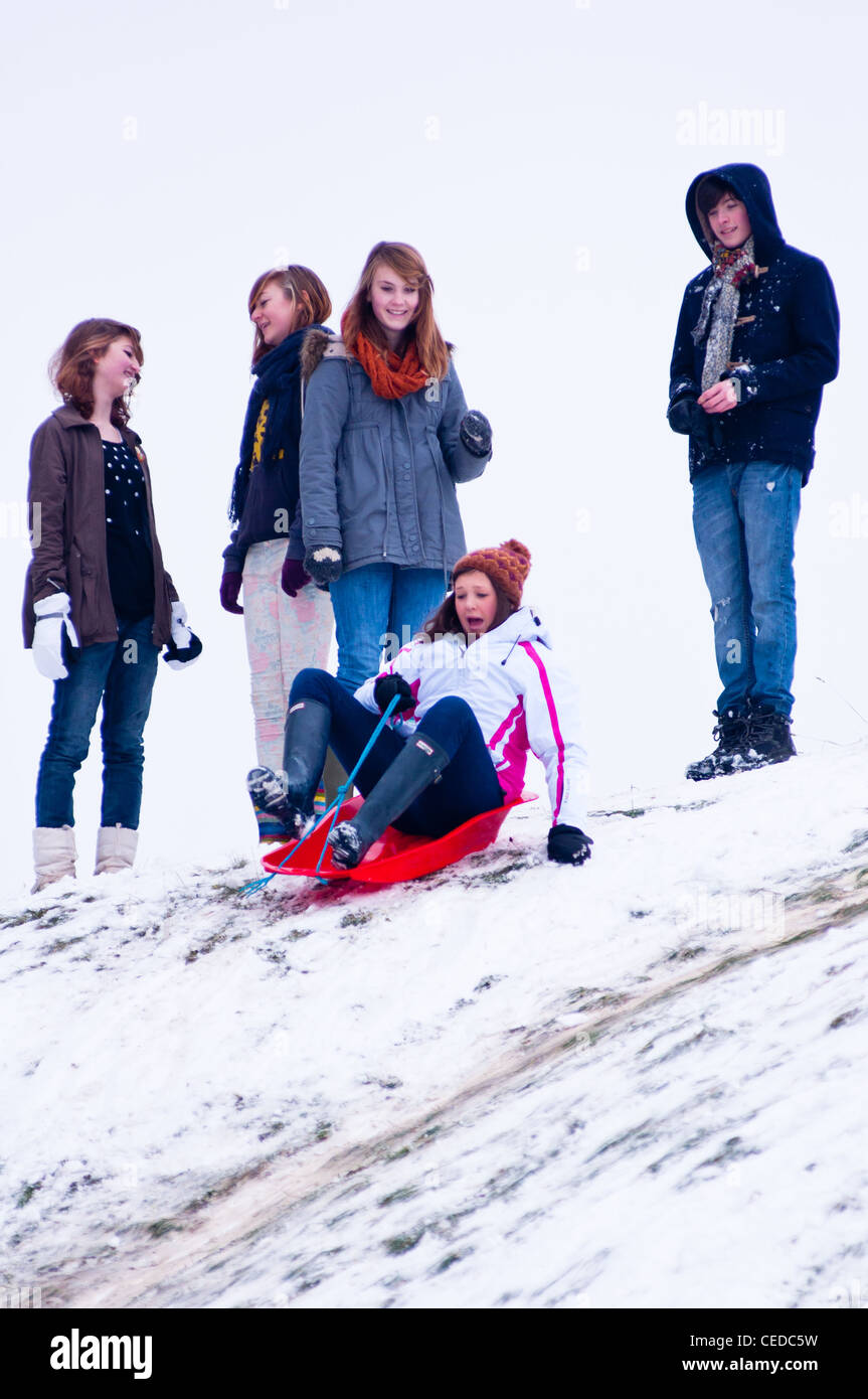 Teenage girls enjoy the snow on Castle mound, Cambridge, UK Stock Photo -  Alamy