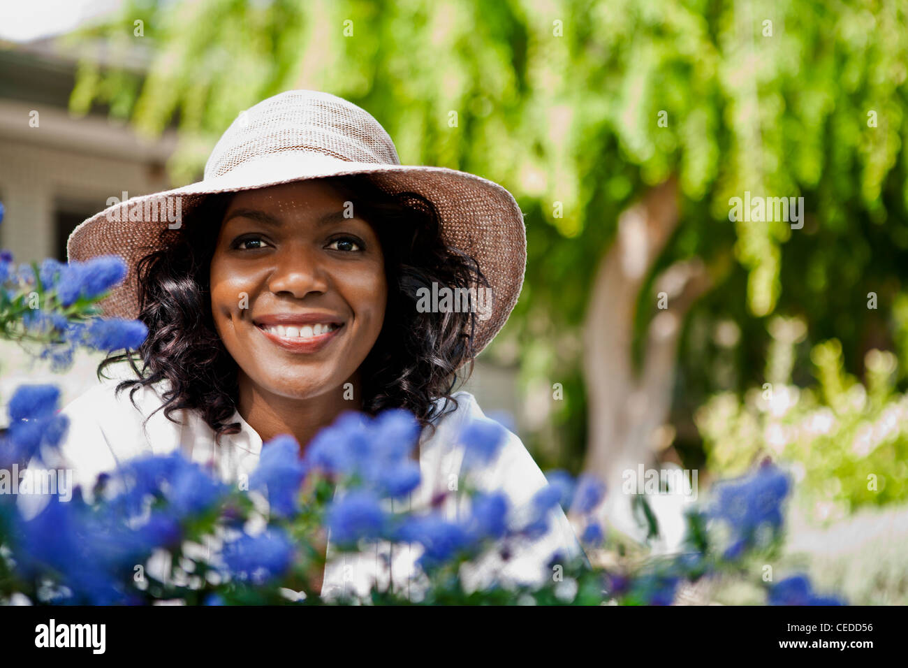 Smiling woman in garden Stock Photo