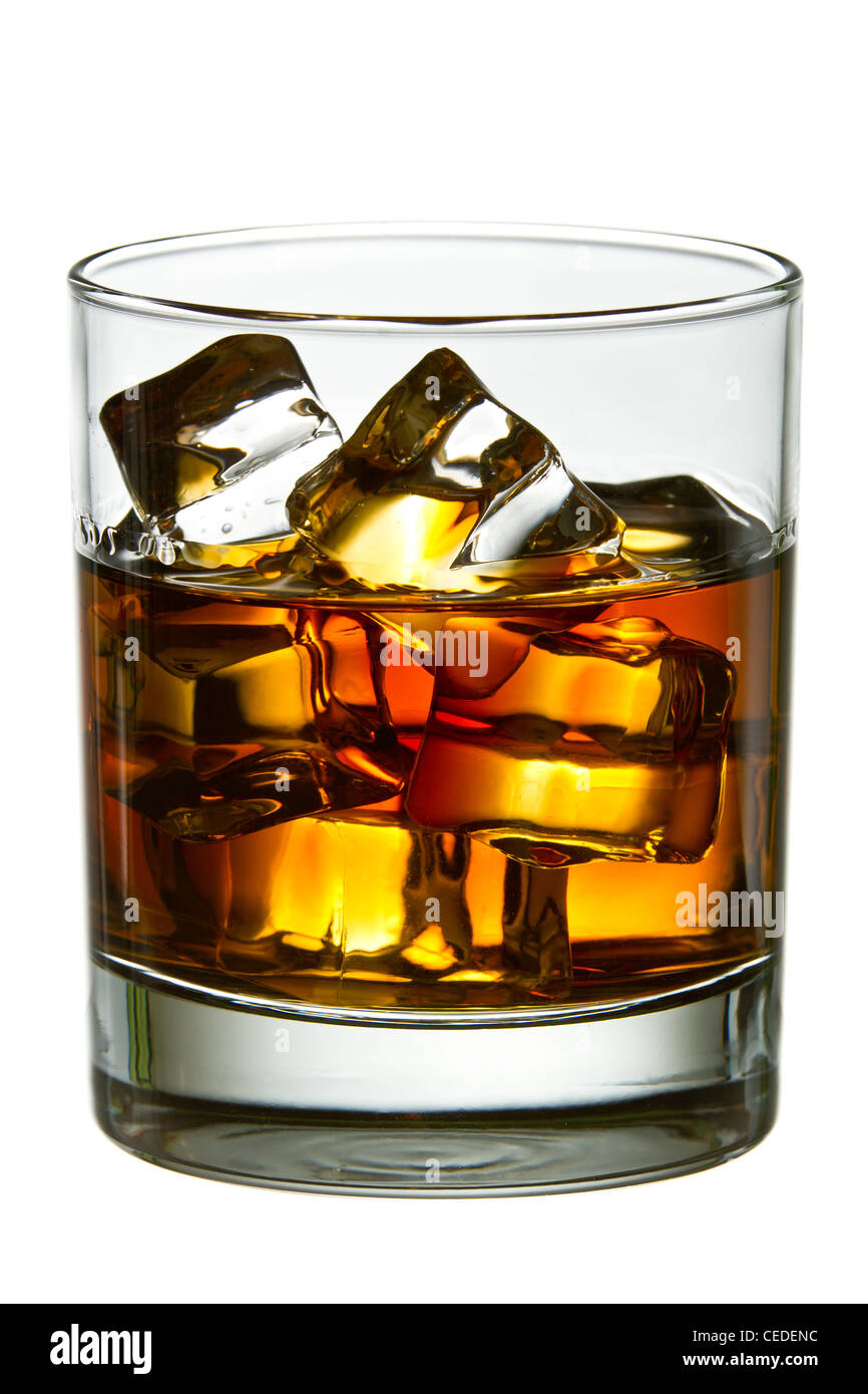 Whiskey with ice cubes in glass Stock Photo - Alamy