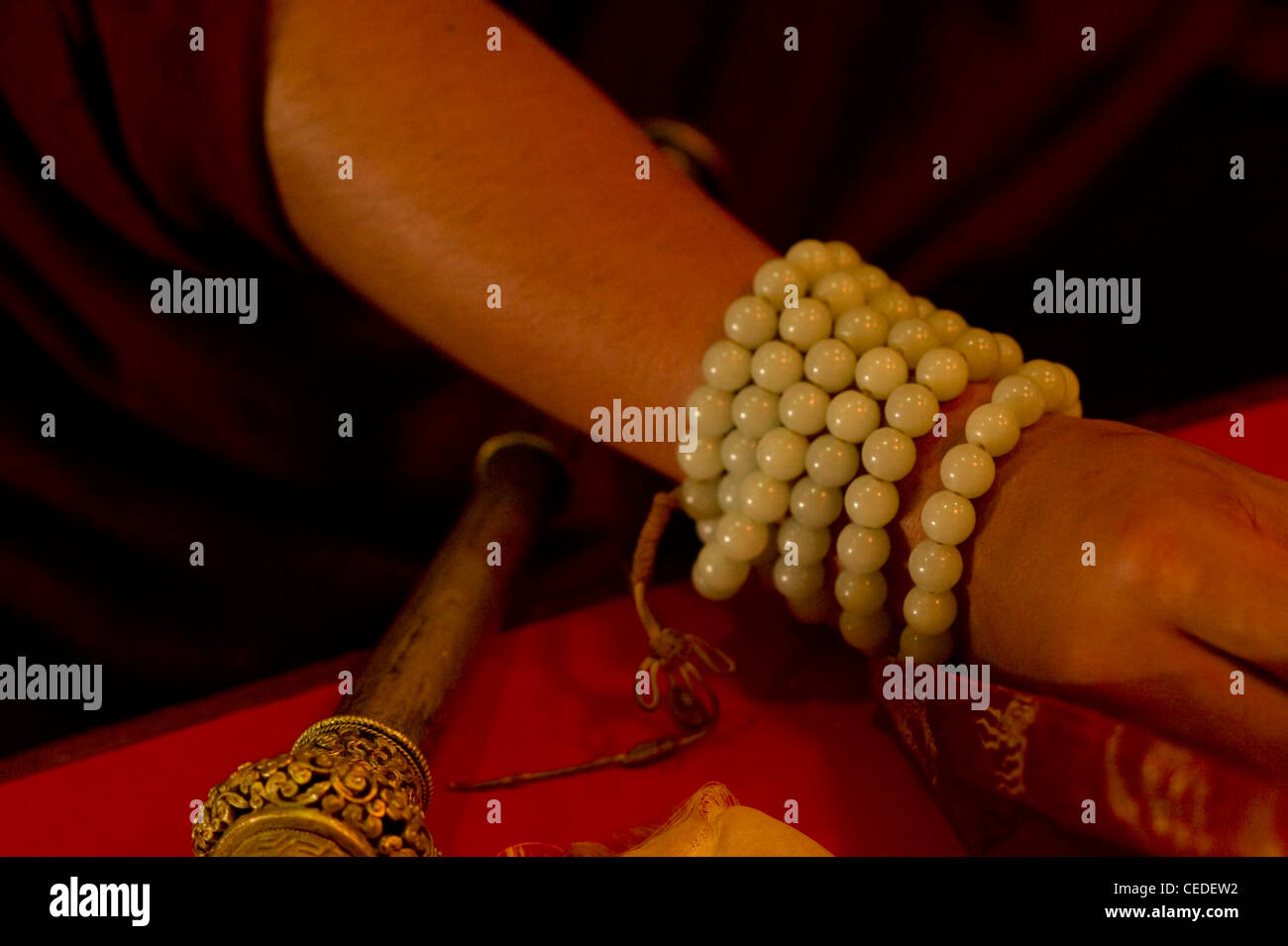 Prayer beads on a Buddhist Monk, Sikkim, India Stock Photo - Alamy
