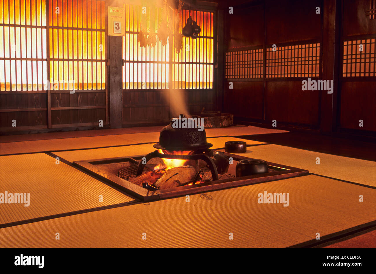 Sunken hearth in a traditional gassho zukuri house, Folk Museum, Shirakawa-go, Gifu Prefecture, Japan Stock Photo