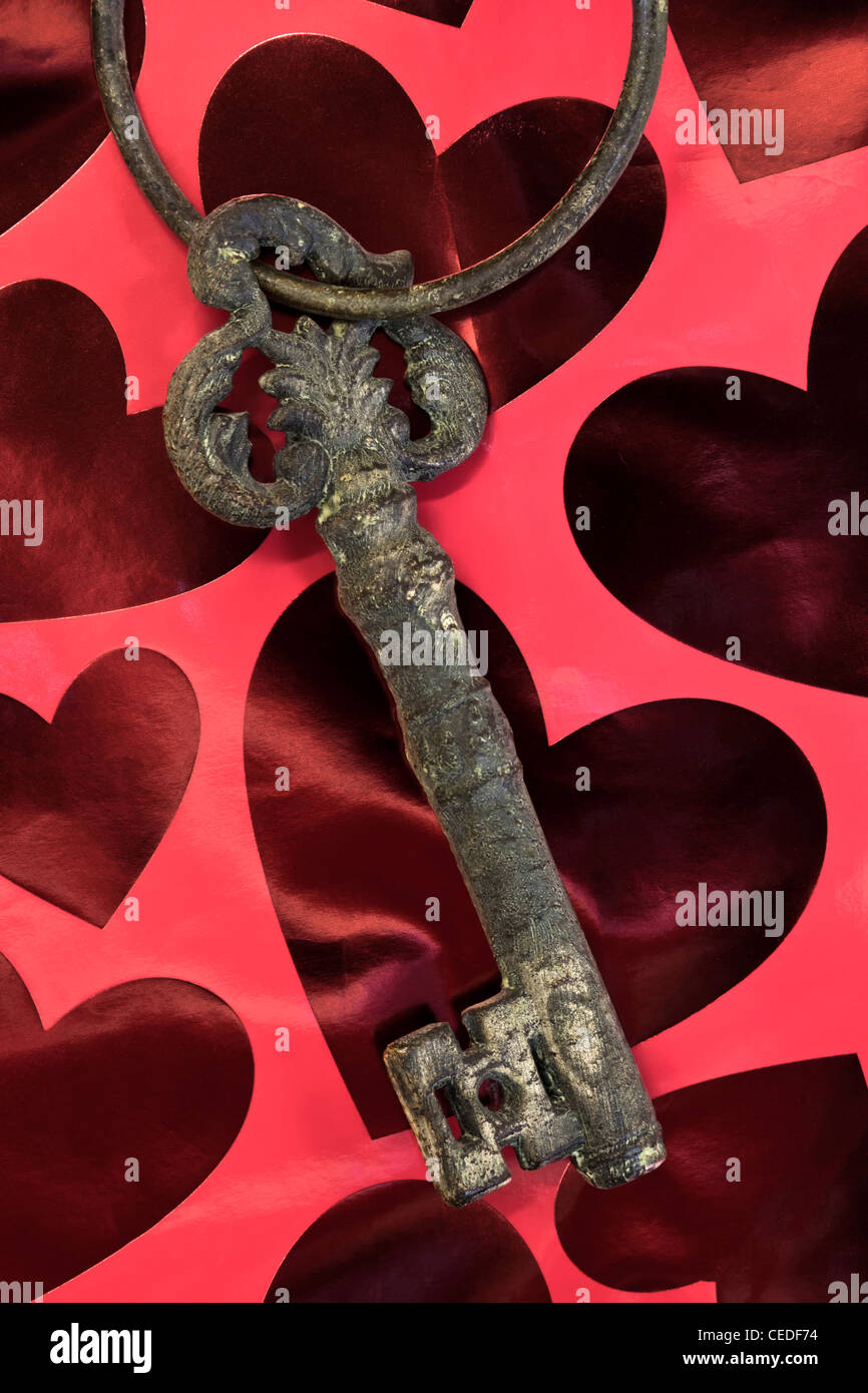 Vintage key, many hearts. Stock Photo