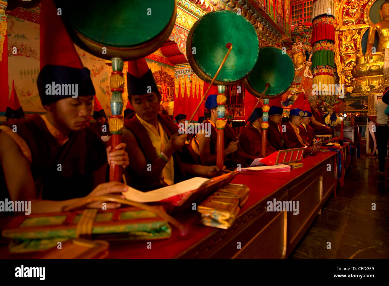 Tibetan monks chanting drums hi-res stock photography and images - Alamy