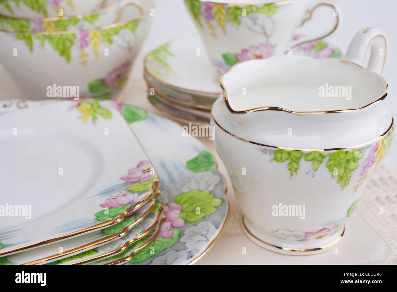 Old floral china tea service, marked Taylor and Kent, Longton, England. Stock Photo